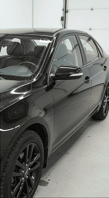 Sedan side after washing — showroom shine